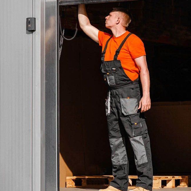 Pracovné nohavice s náprsenkou NEO L/52